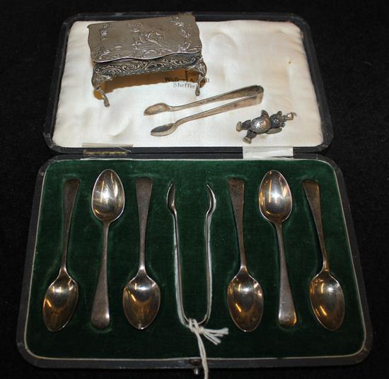 Small silver- a miniature table, cased coffee spoons, a miniature teddy bear and a pair of tongs